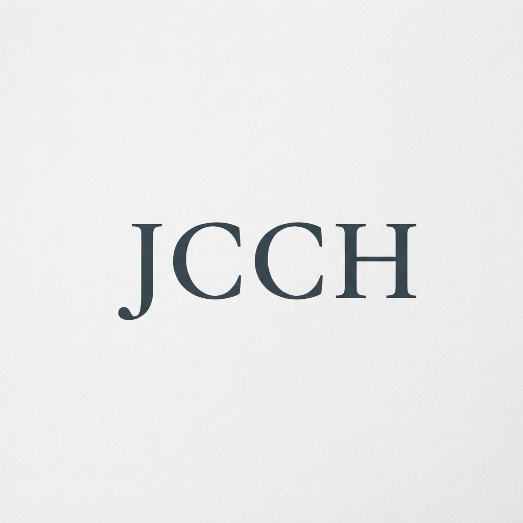Large dark blue-gray serif letters “JCCH” centered on a lightly textured white background.